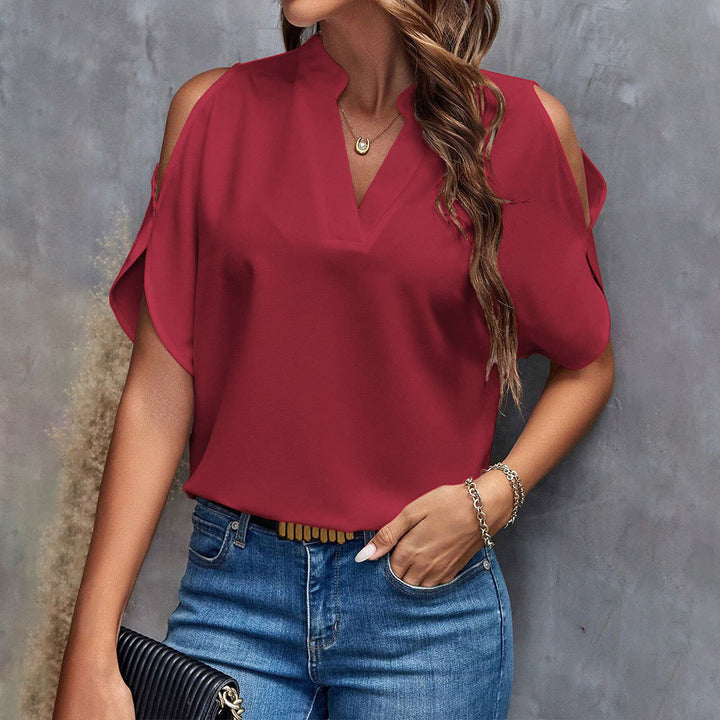 Kvinders elegante bluse med udskåret ærmedesign og fashionable stående krave Stilla