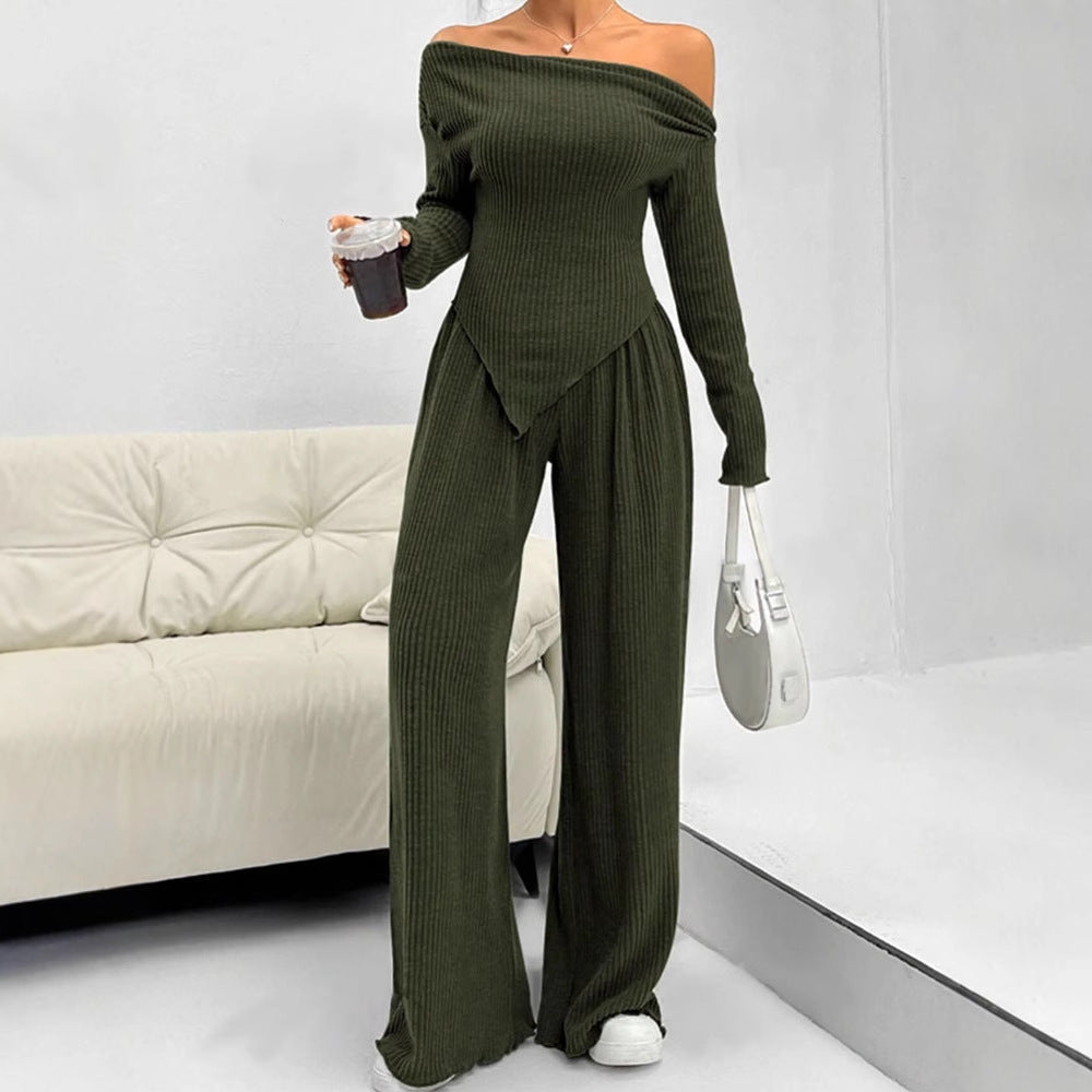 Dame tætsiddende jumpsuit med asymmetrisk udskæring og lange ærmer Skovae
