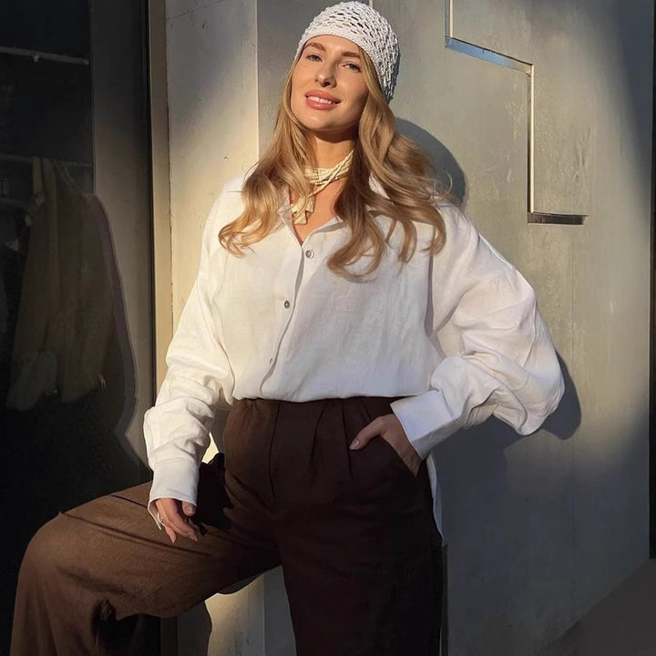 Dame Let Linned bluse med slidte skuldre Stilla