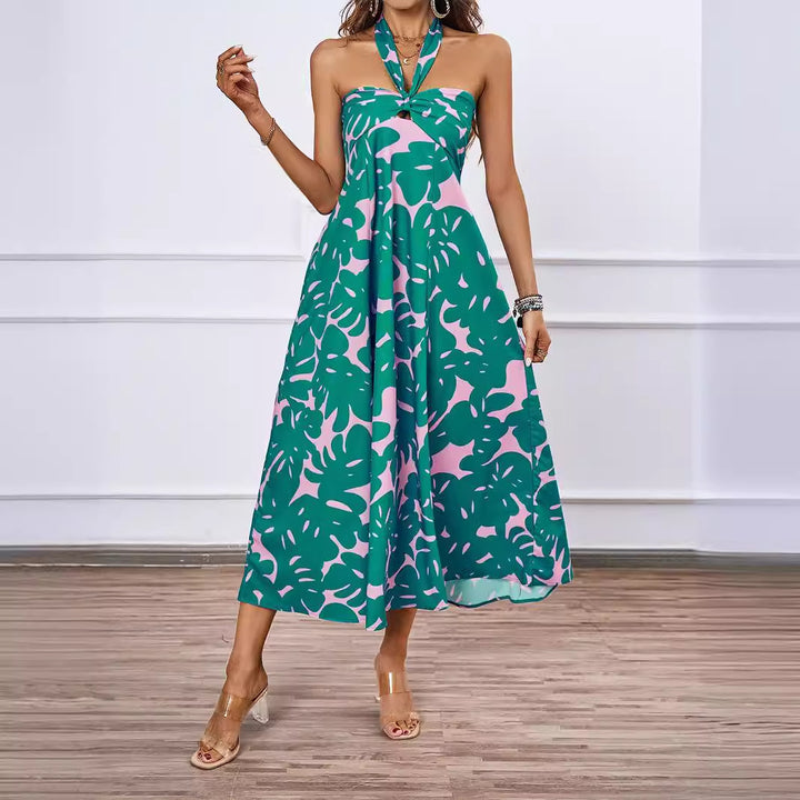 Dame maxikjole med skulderfri design og floral twist Stilla