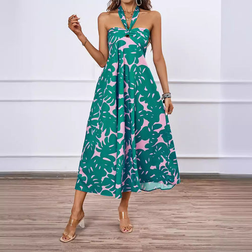 Dame maxikjole med skulderfri design og floral twist Stilla