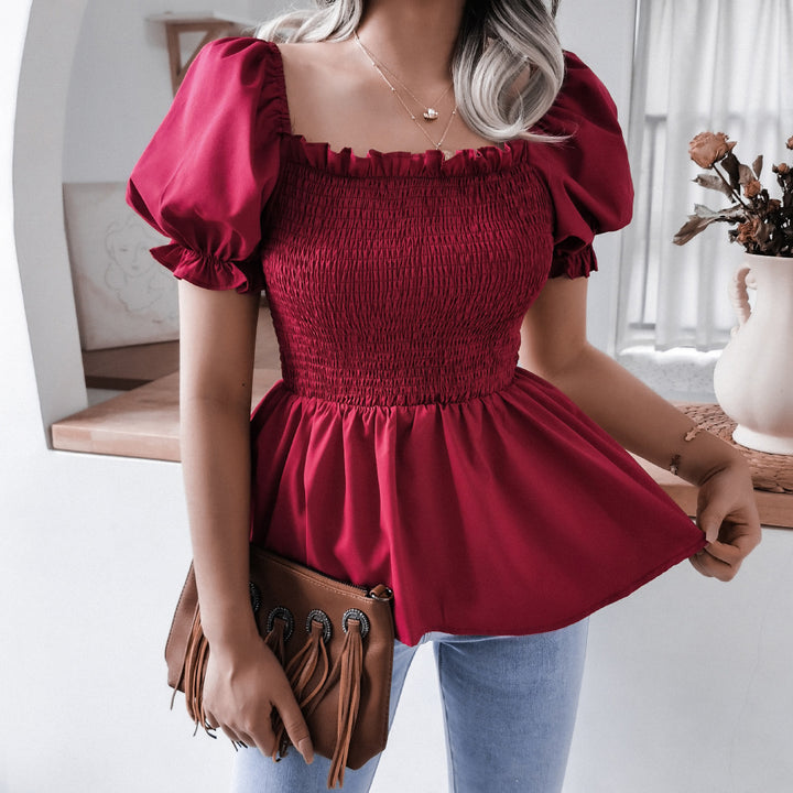 Dame puffærme bluse med flæsedetaljer og elastisk bund Stilla