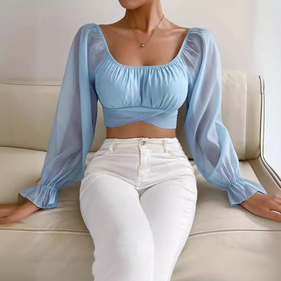 Damer cropped bluse med puffærmer og raffineret snit Skovae