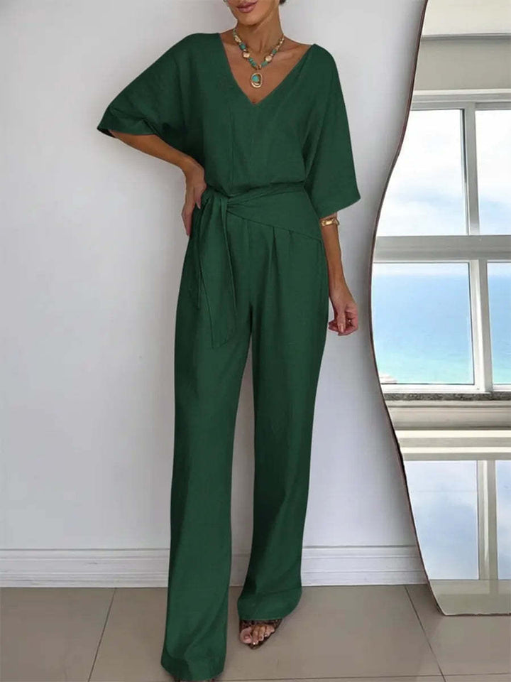 Kvinder Elegant Jumpsuit med Skræddersyet Snit og Dækningsbælte Skovae