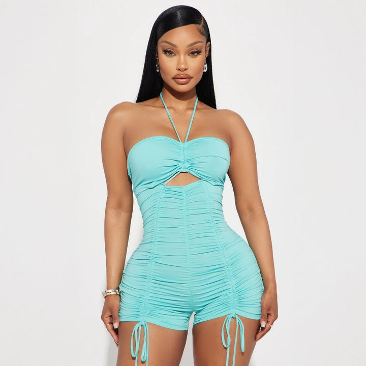 Dame strandoutfit med raffineret cut-out-design og flæsedetaljer Stilla