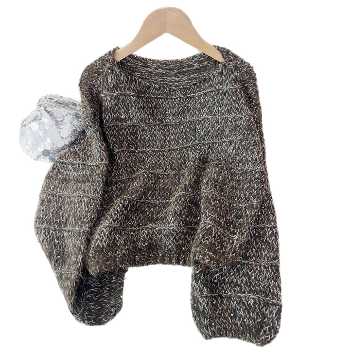 Damernes fashionable chunky striktrøje med en afslappet pasform og ballonærmer Stilla