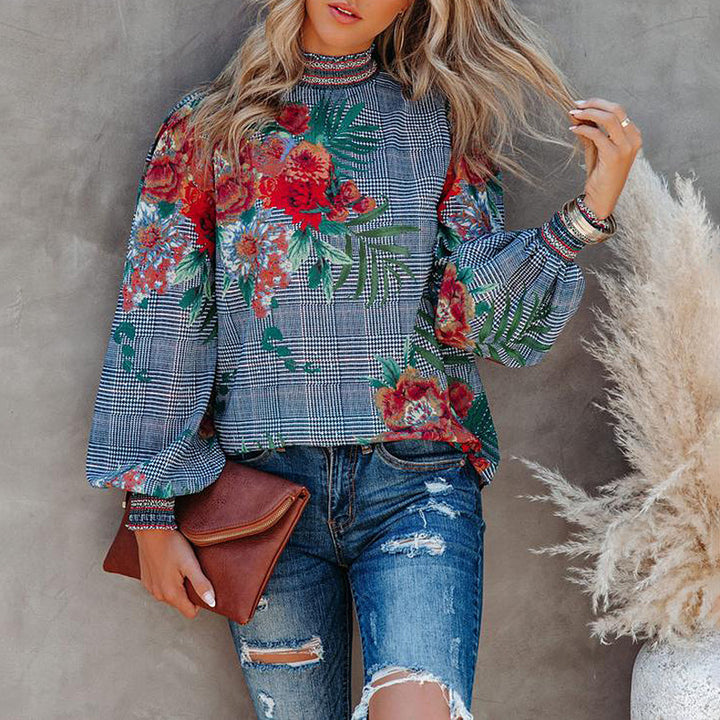 Damer modebluse med puffærmer og blomstret design Stilla