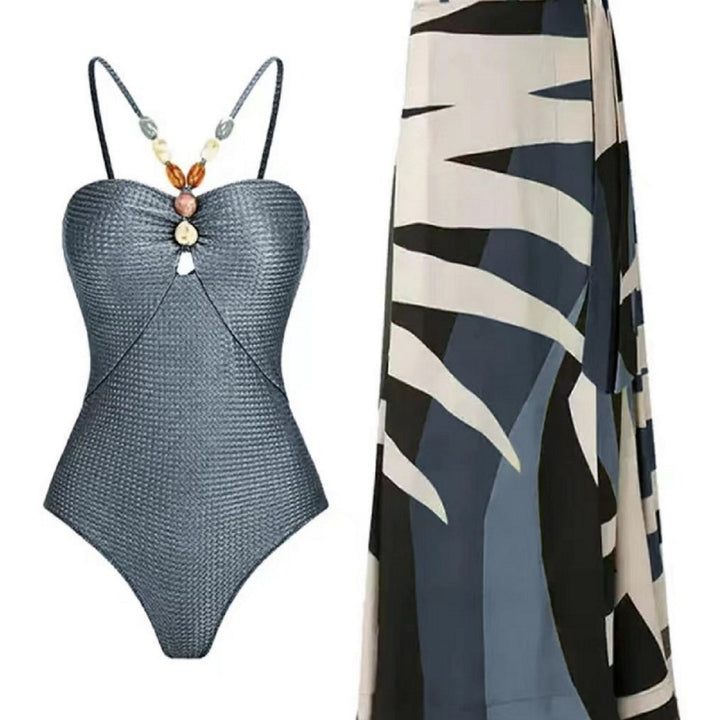 Damer onepiece badedragt med modiske detaljer og stilfuld omslagskjørt Stilla