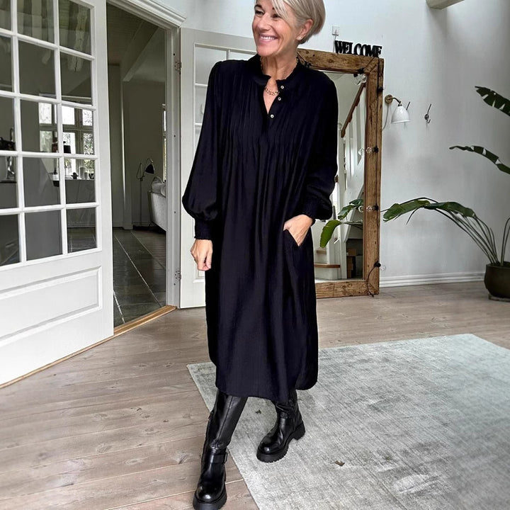 Dame Midikjole med elegant folderstruktur og praktiske lommer Stilla