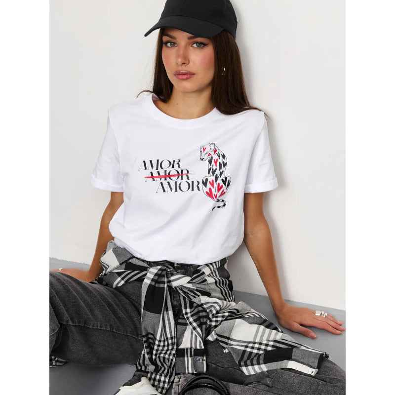 Dame T-shirt med styliseret dyremotiv og inspirerende skrift Stilla