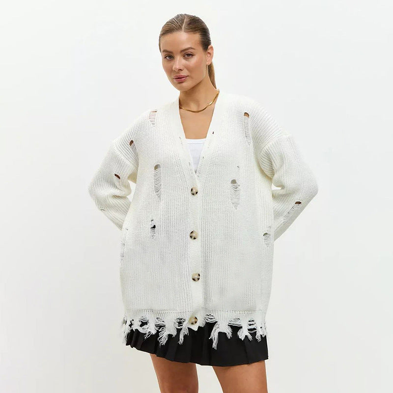 Dame oversized strikpullover med frynset detaljer og afslappet struktur Stilla