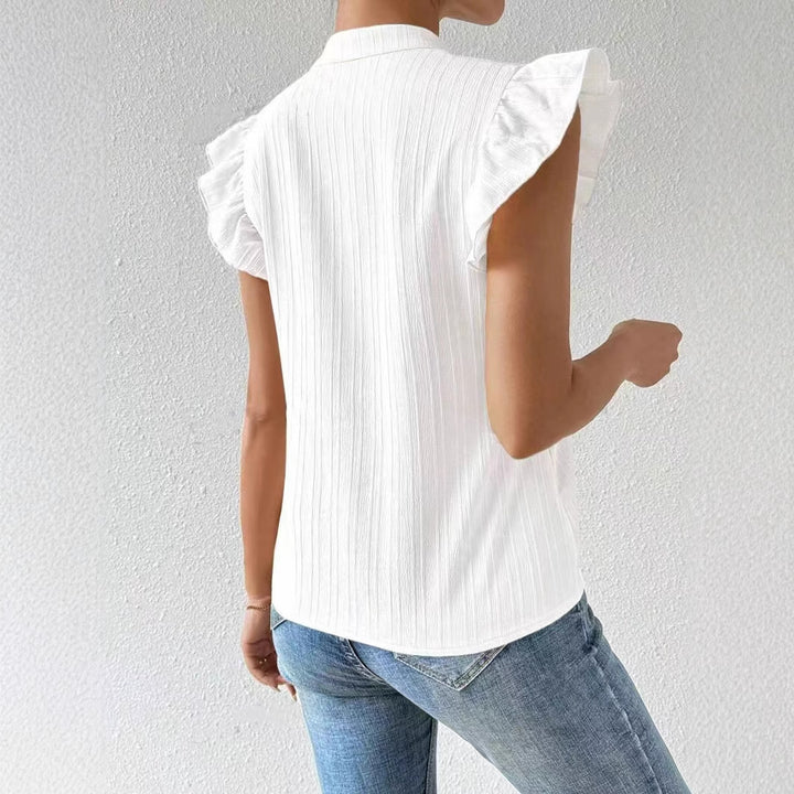 Dame broderet bluse med flæsedetaljer og V-udskæring Stilla