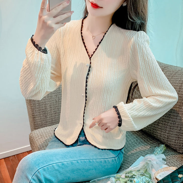 Kvinders bluse med fine lace accenter og elegant snit Stilla