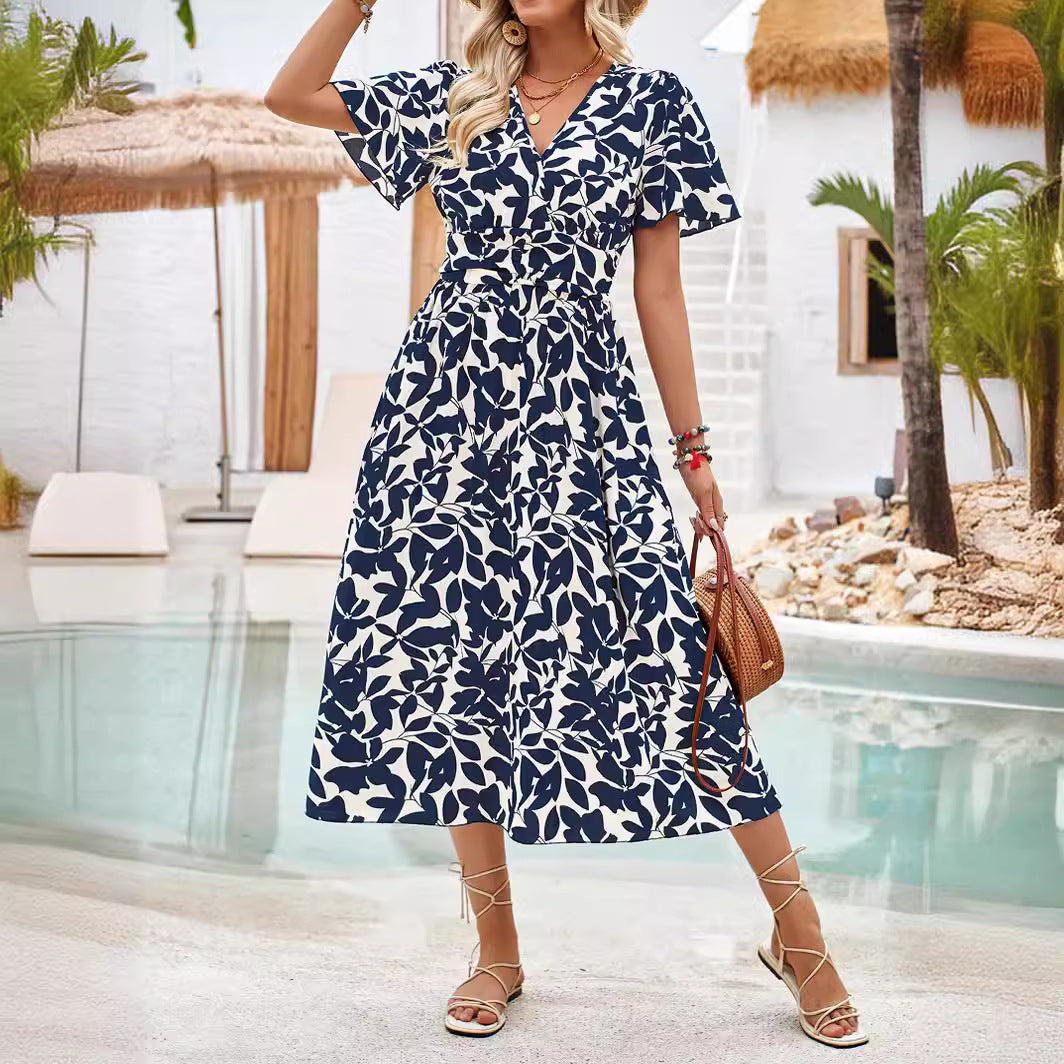 Dame maxikjole med blomstret print og figursyet design Stilla