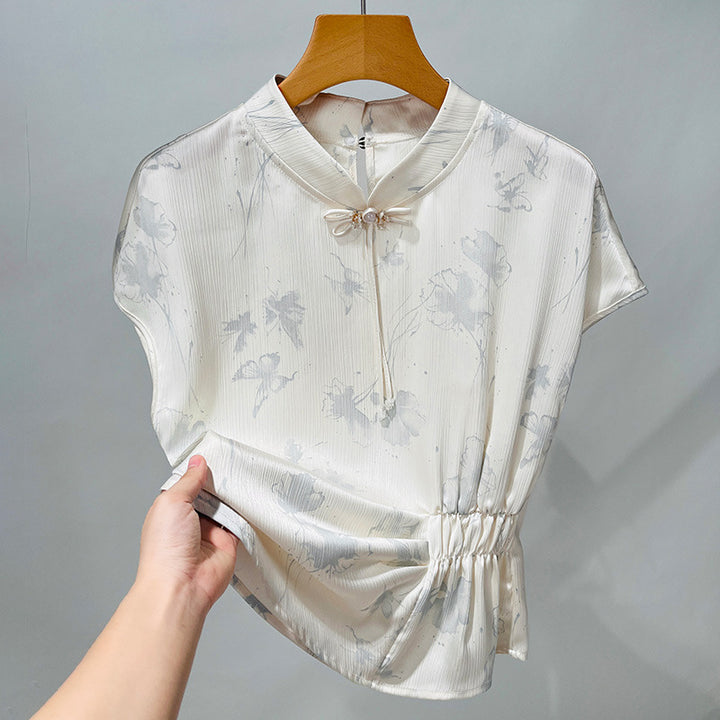 Damebluse med blomsterdesign og raffineret rynkeelement Stilla