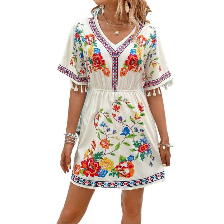 Dame mini-kjole med blomstret design og fine frynser Stilla