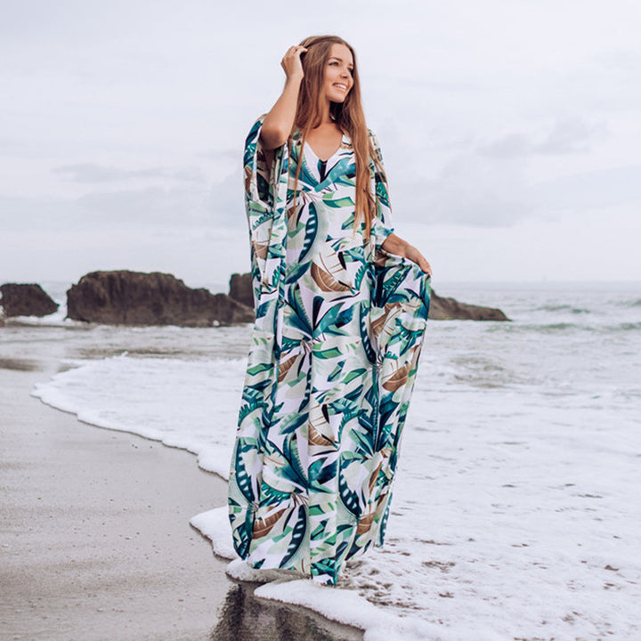 Dame strandkaftan med blomstermotiv og luftig pasform Stilla