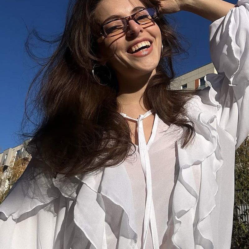 Damer ruffle blouse med gennemsigtige ærmer og sløjfe lukning Stilla