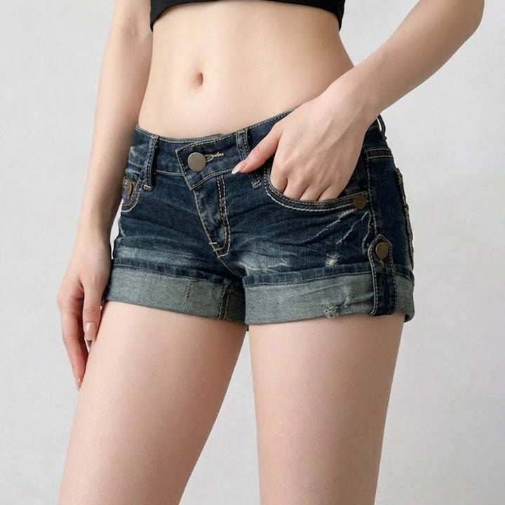 Dame casual denim shorts med fashionable distressed detaljer og ombukket kant Skovae