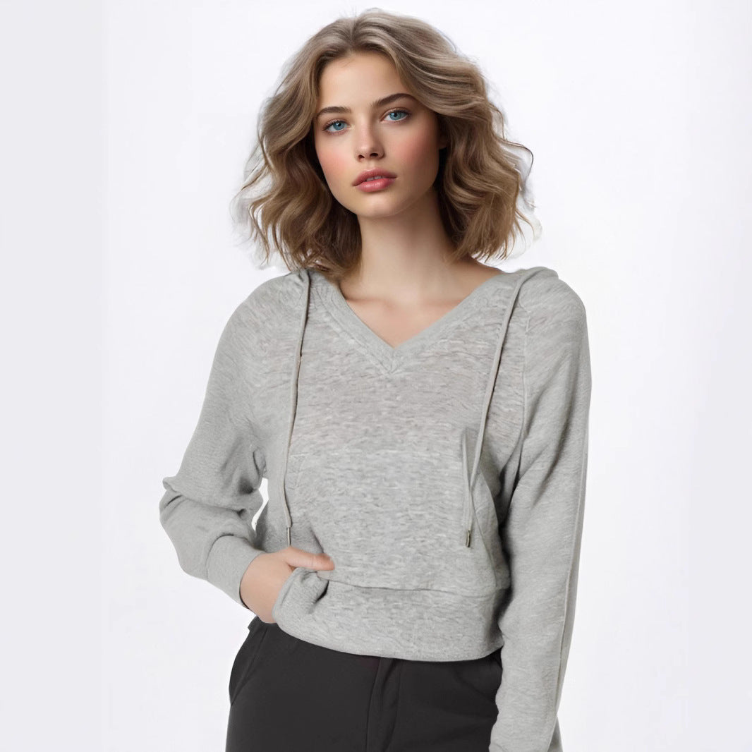 Dame V-hals sweatshirt med praktisk frontlomme-design og afslappet snit Stilla