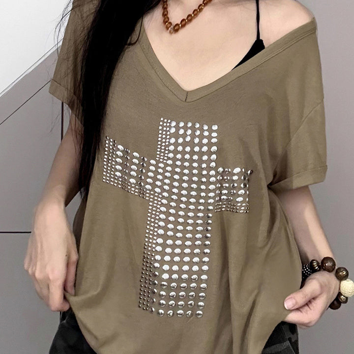 Dame stilfuld oversized T-shirt med kors-print og glimmerdetaljer Skovae