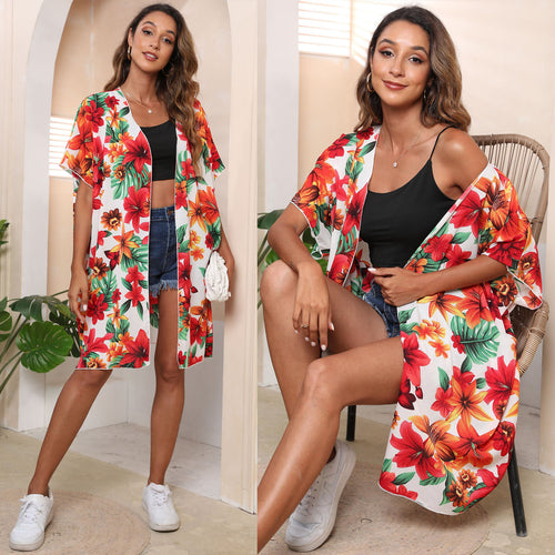 Damer let strandkimono med blomsterdesign og luftig, åben silhuet Stilla