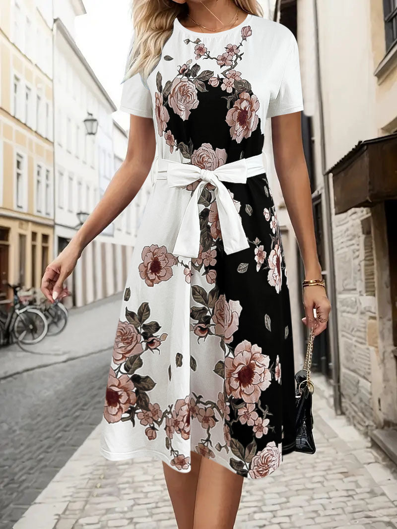 Damekjole med floral design og taljerbart bælte Stilla