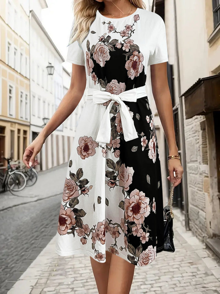 Damekjole med floral design og taljerbart bælte Stilla