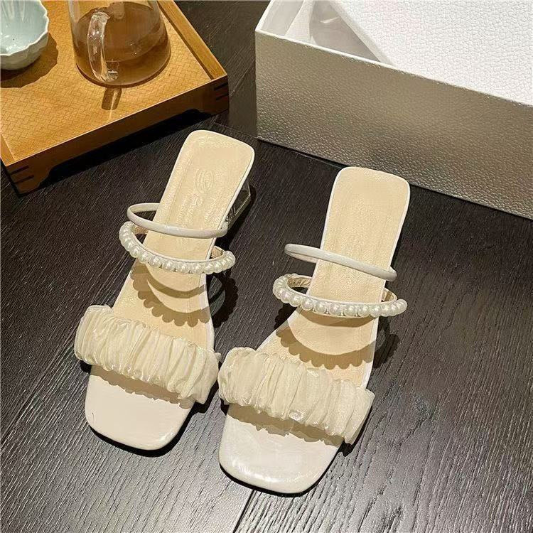 Dame sandaler med elegant flæse-design og moderigtigt perle-accent Stilla