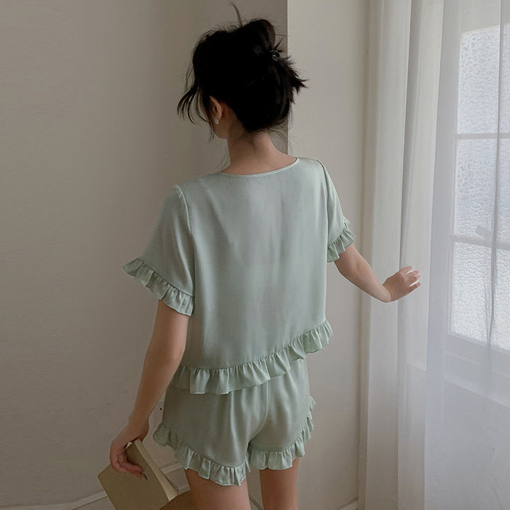 Dame Pyjama-sæt med voluminøst flæse design og elegant bælte Stilla
