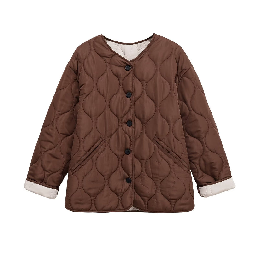 Kvinders quilted jakke med moderne knapdetaljer Stilla