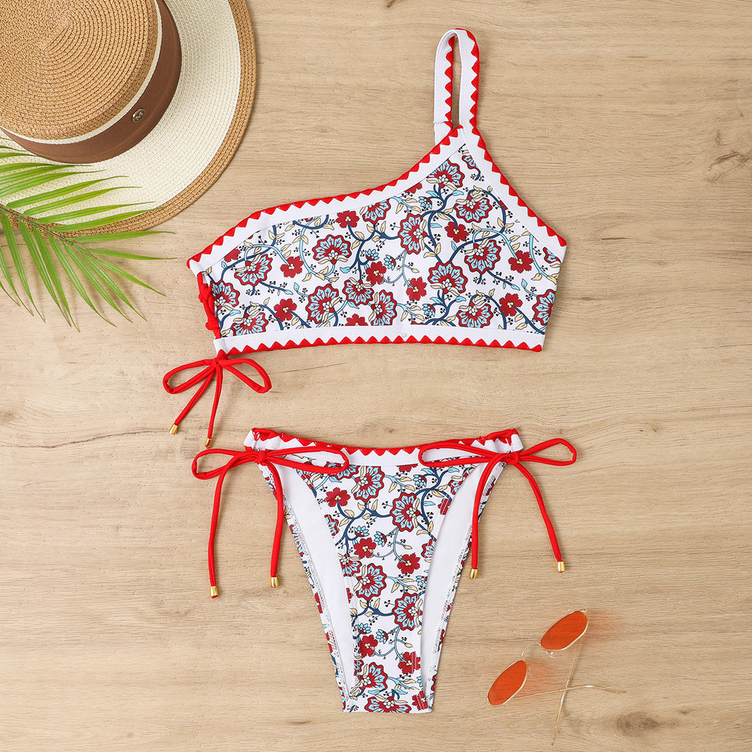 Dame bikinioberdel med asymmetrisk snit og floralt design Stilla