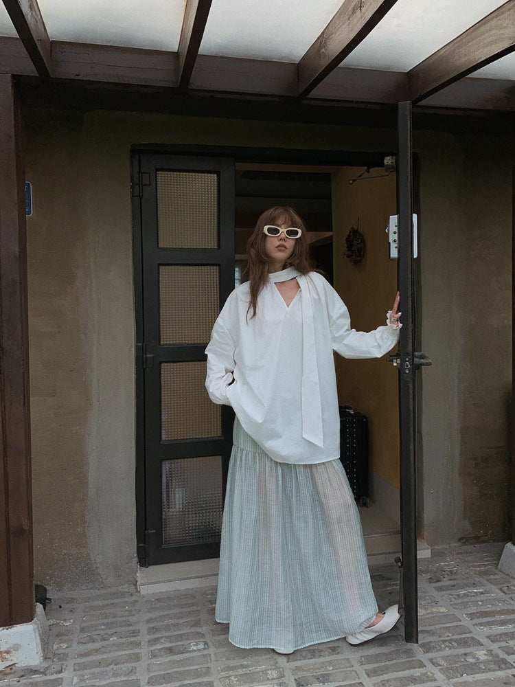 Dame Oversized Bluse med gennemgående indpakningsdesign og elegante detaljer Stilla
