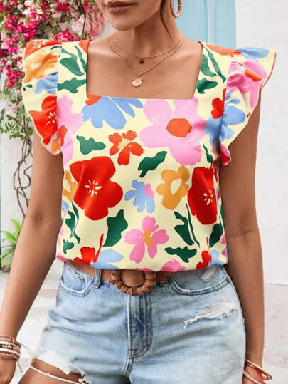 Damebluse med flæsekanter og blomstermotiver Stilla