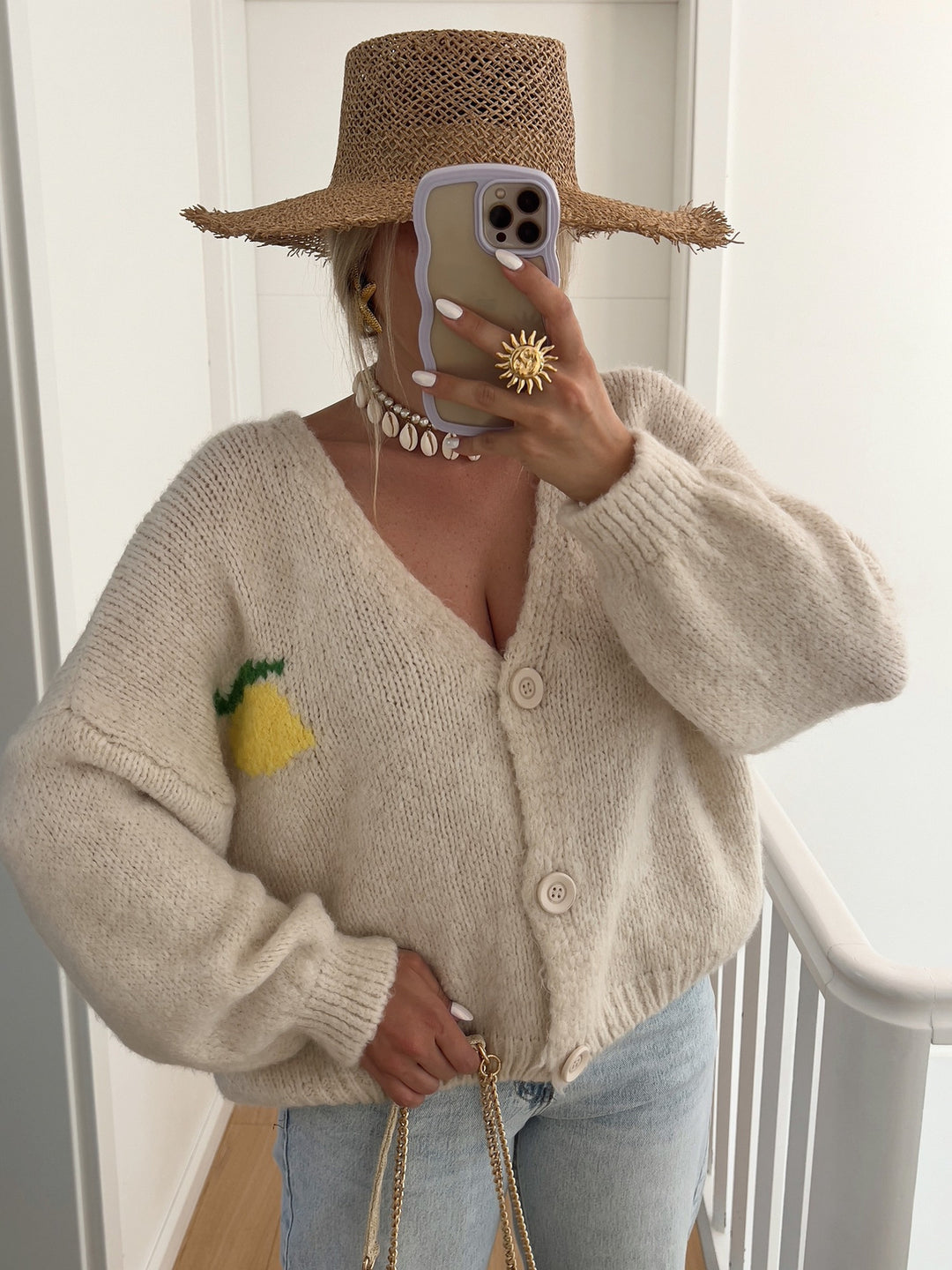 Dame strikjakke med muntert citrondesign og oversized snit Stilla