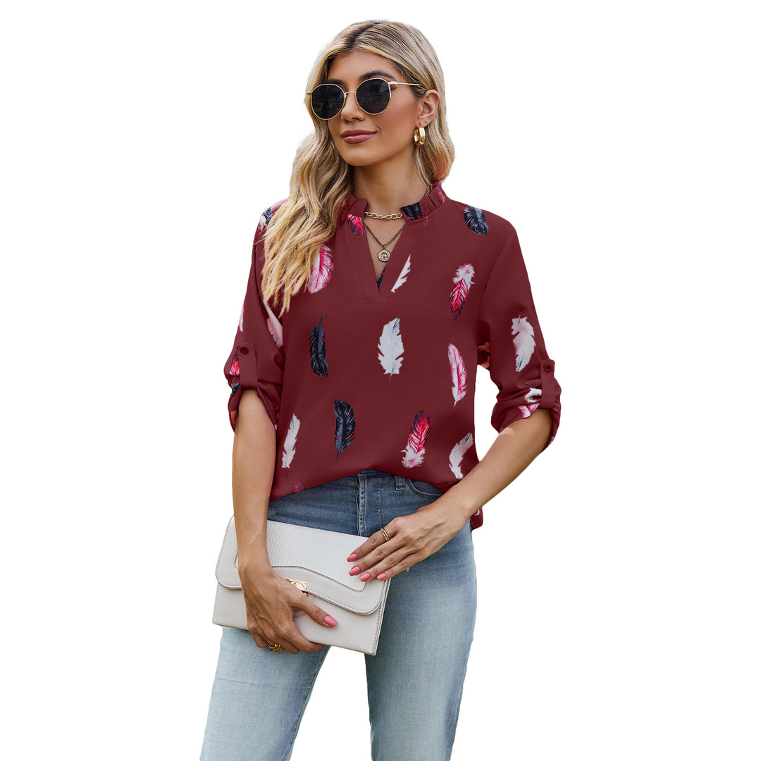Damebluse med elegant fjerdesign og halvlange ærmer Stilla