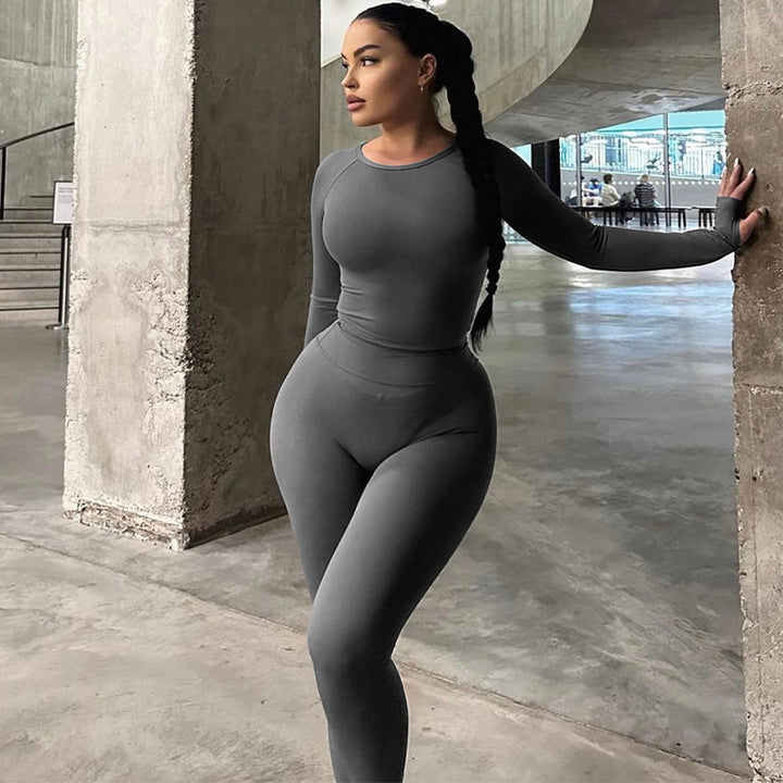 Dame Sporty sæt bestående af langærmet top og leggings med høj talje og figursyet pasform Stilla