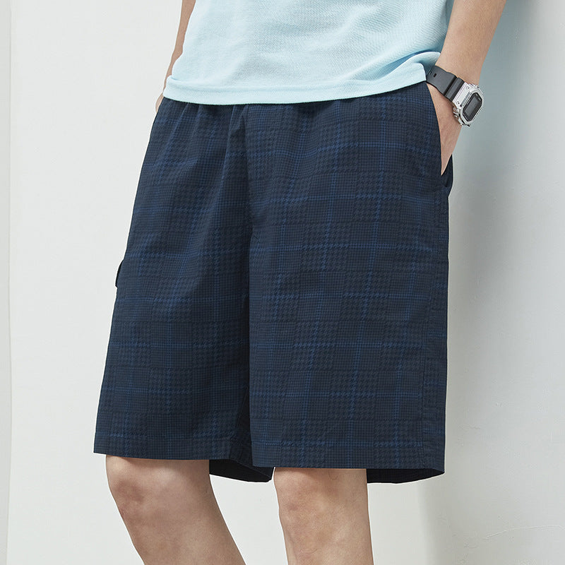 Herrer afslappede plaid shorts med elastisk linning og praktiske sidelommer Stilla