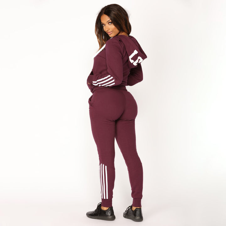 Damer sporty sweatshirt sæt med hætte og moderne kontraststriber