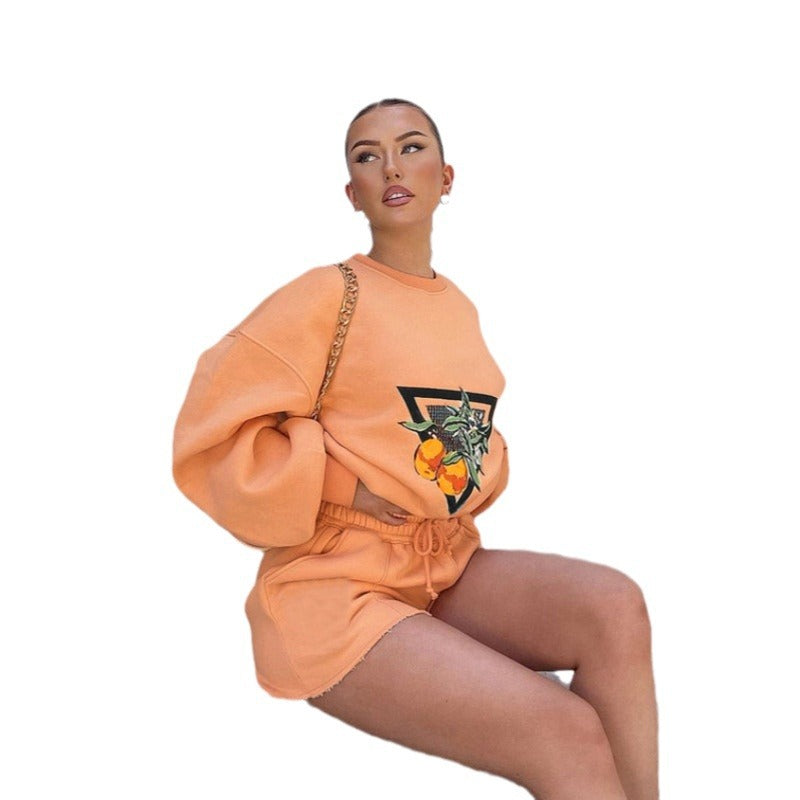 Dame afslappet sweatshirt og shorts sæt med frugtagtig design Stilla