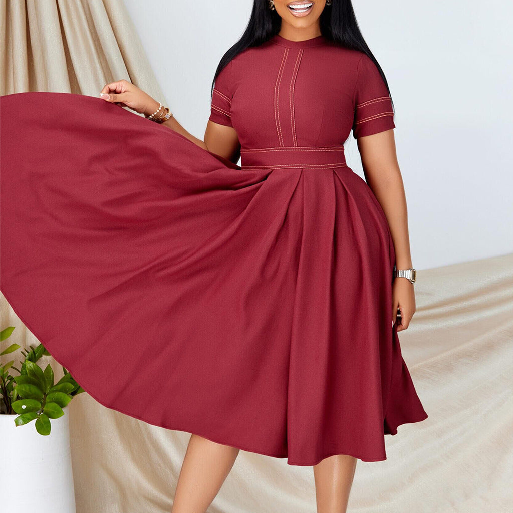 Dame midikjole med elegant snit og svajende skirt Stilla