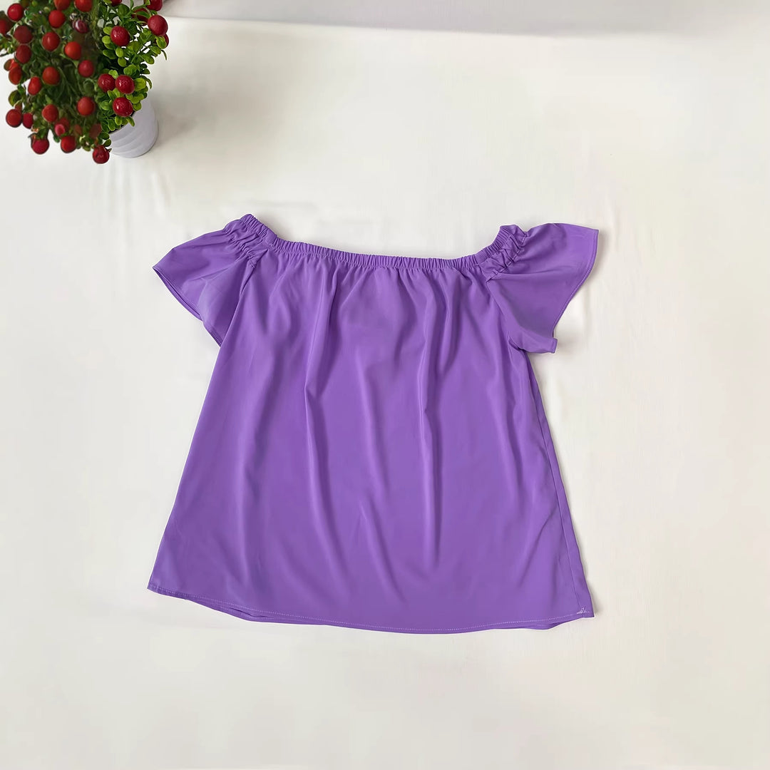 Damer Legesygt top med off-shoulder detaljer og flæseelementer Skovae
