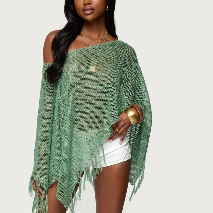 Dame netponcho med glitrende accenter Skovae