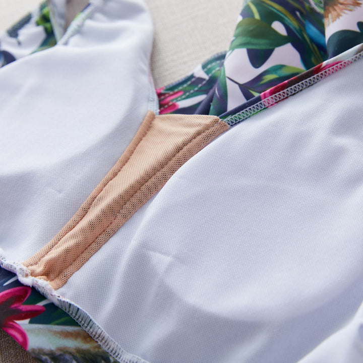 Dame bikini-sæt med blomsteroverdel og højt skåret trusse Stilla