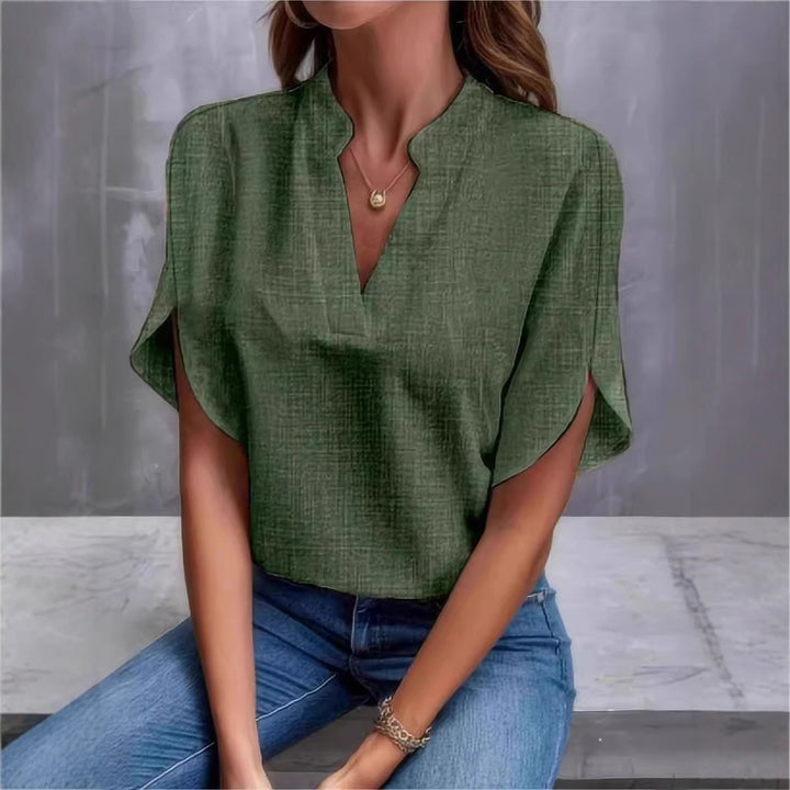 Dame elegant kortærmet bluse med moderne ståkrave og casual sideslidser Stilla