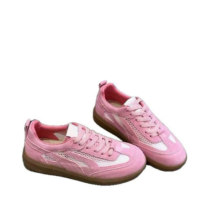Dame sneakers i sportsligt-elegant design med åndbart mesh-overflade og modeaccent Stilla