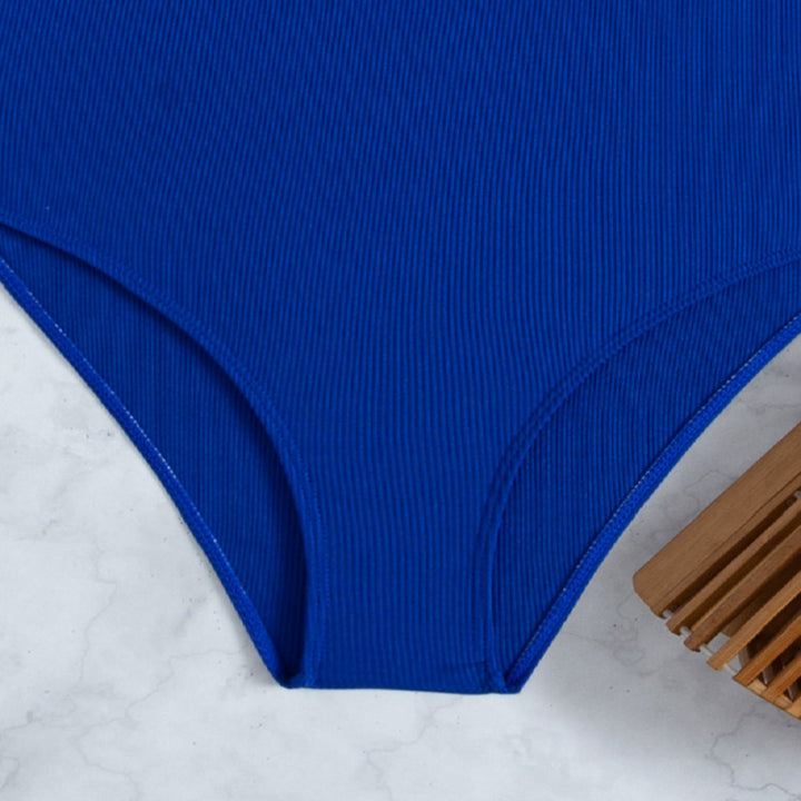 Dame heldragt badedragt med fashionabel volant og tropisk print Stilla