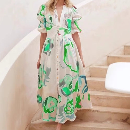 Dame Maxi-kjole med farverigt blomstermønster og elegant knapstolpe Stilla