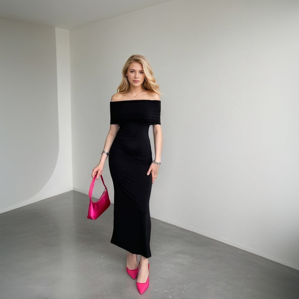 Kvindernes maxikjole med off-shoulder snit og stilfuld slids Stilla
