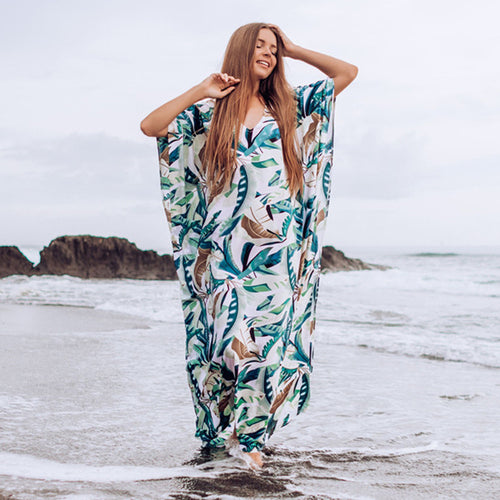 Dame strandkaftan med blomstermotiv og luftig pasform Stilla